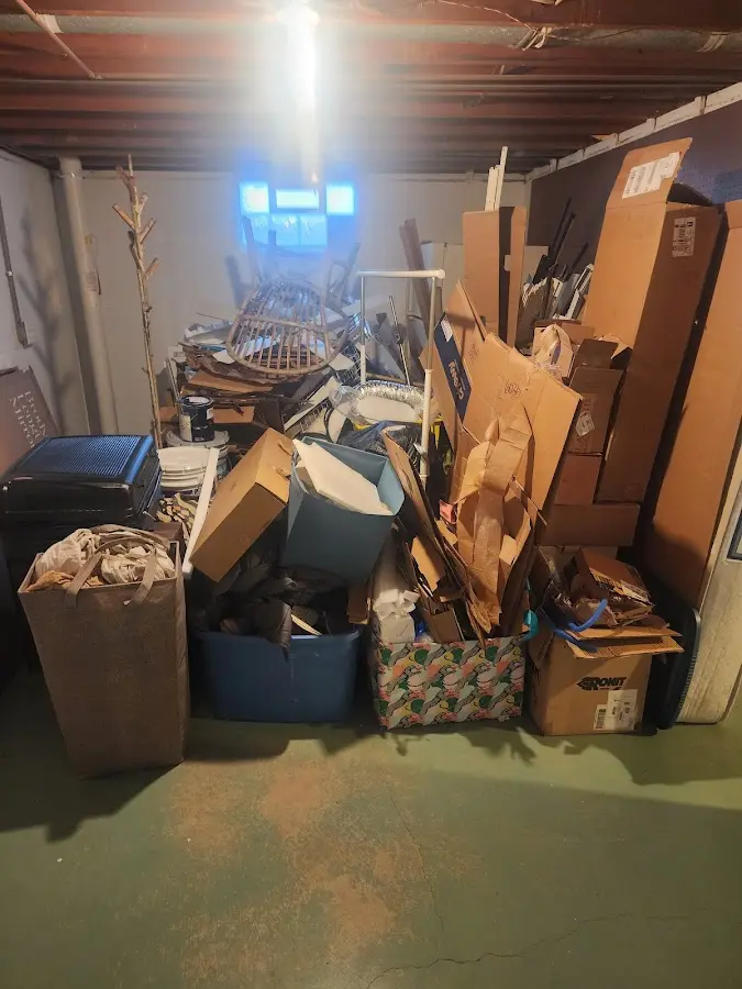 Roll-off dumpster container at job site for Yard Waste Dumpster Rental in Danbury